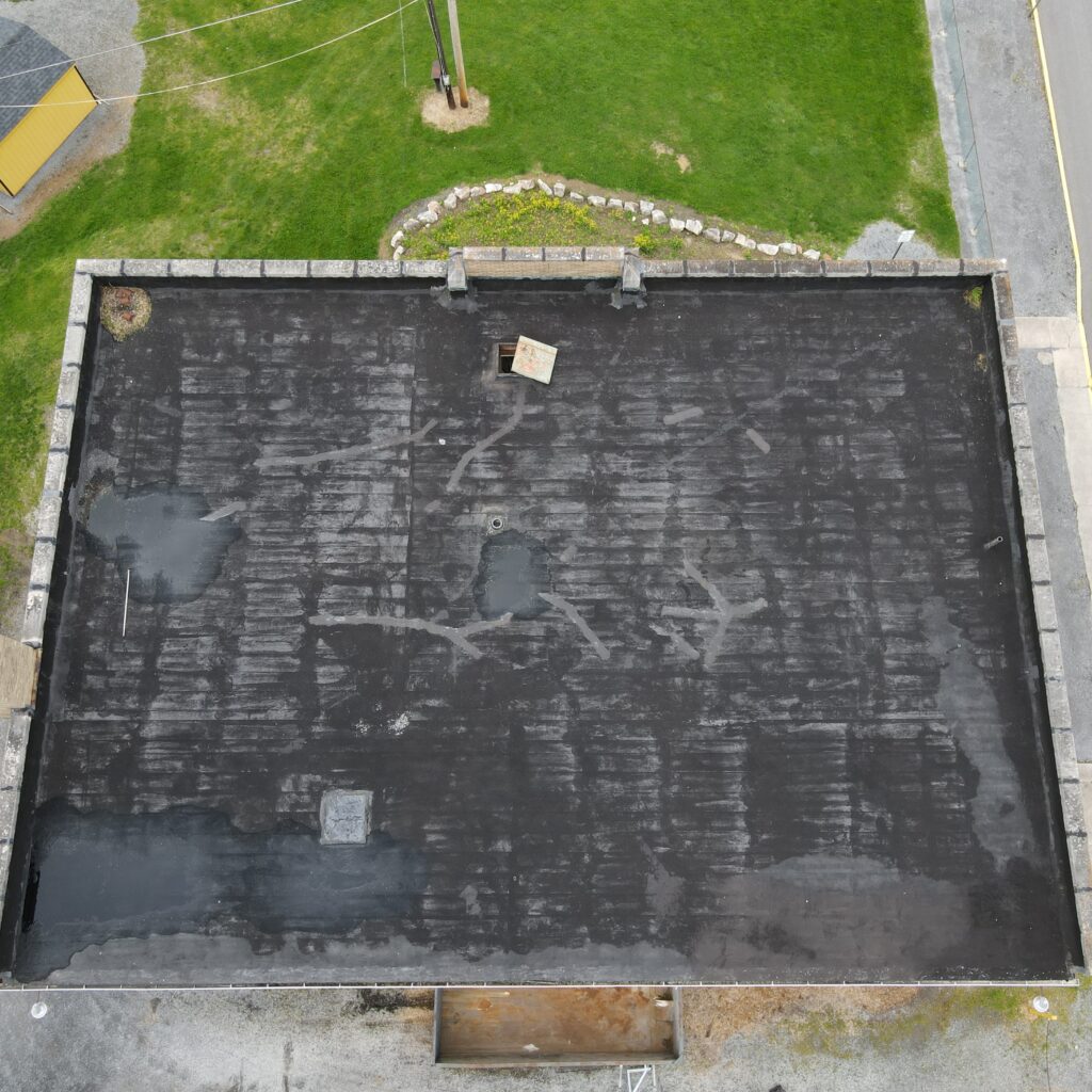A Damaged EPDM Roof in Need of Repair.