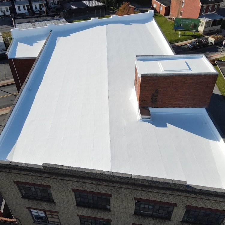Side view of an elastomeric roof system